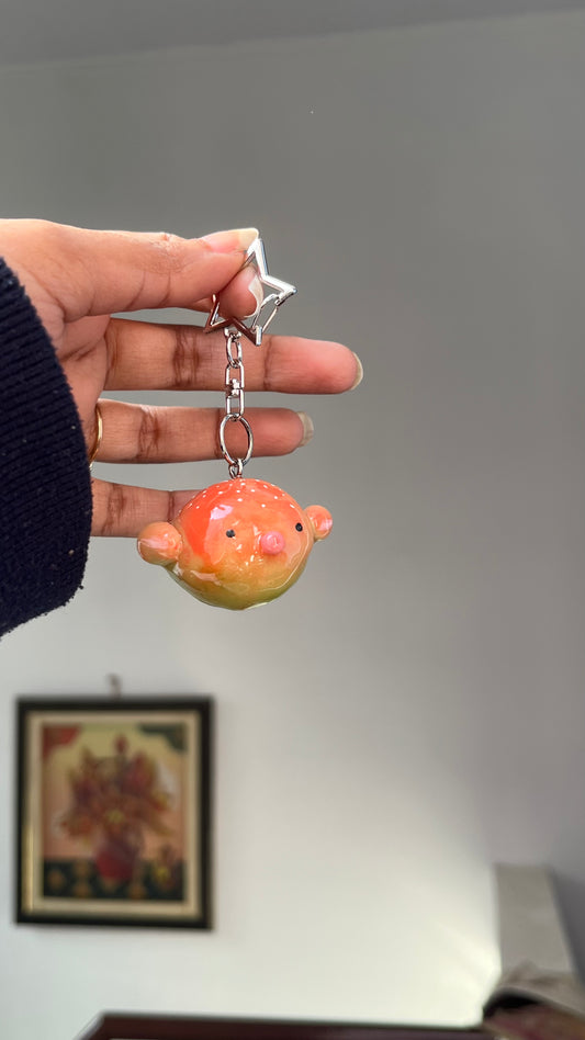 Pink green puffer fish