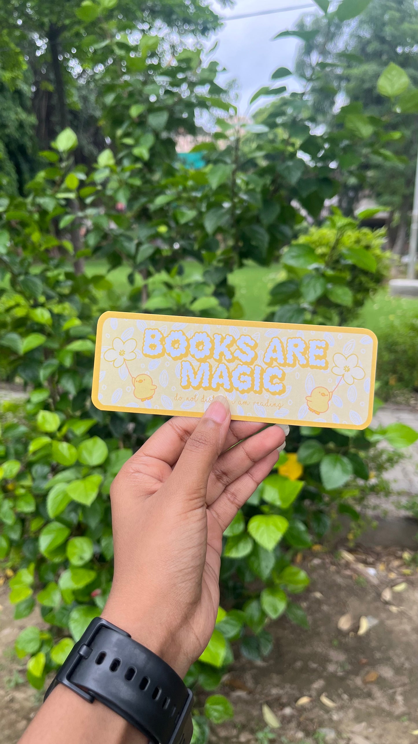 books are magic in yellow bookmark