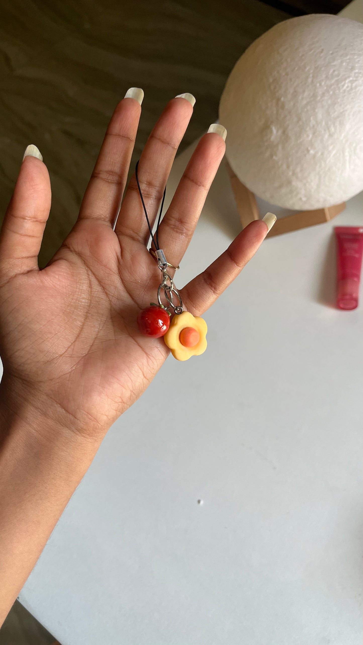 flower with tomato charm