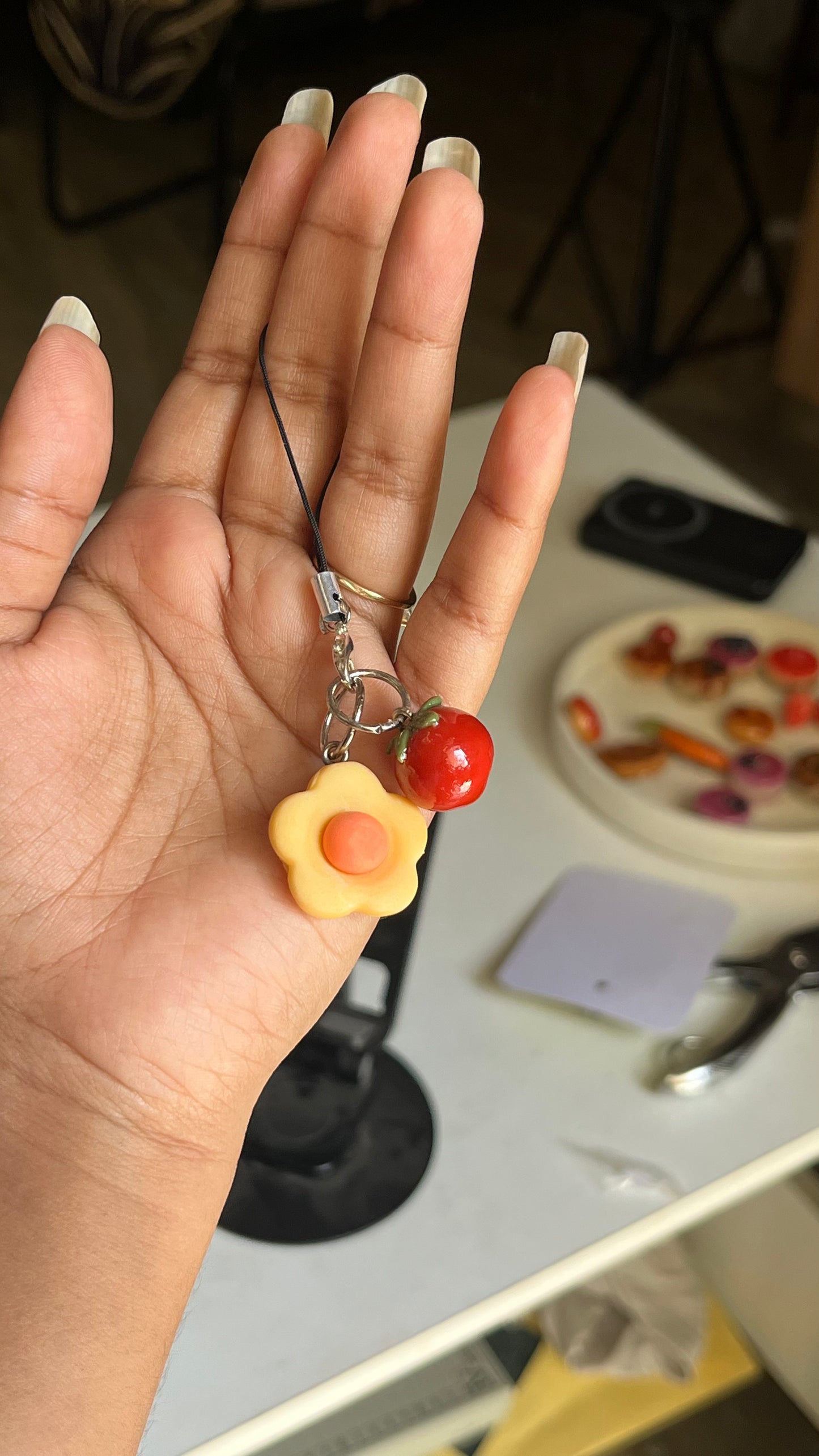 flower with tomato charm