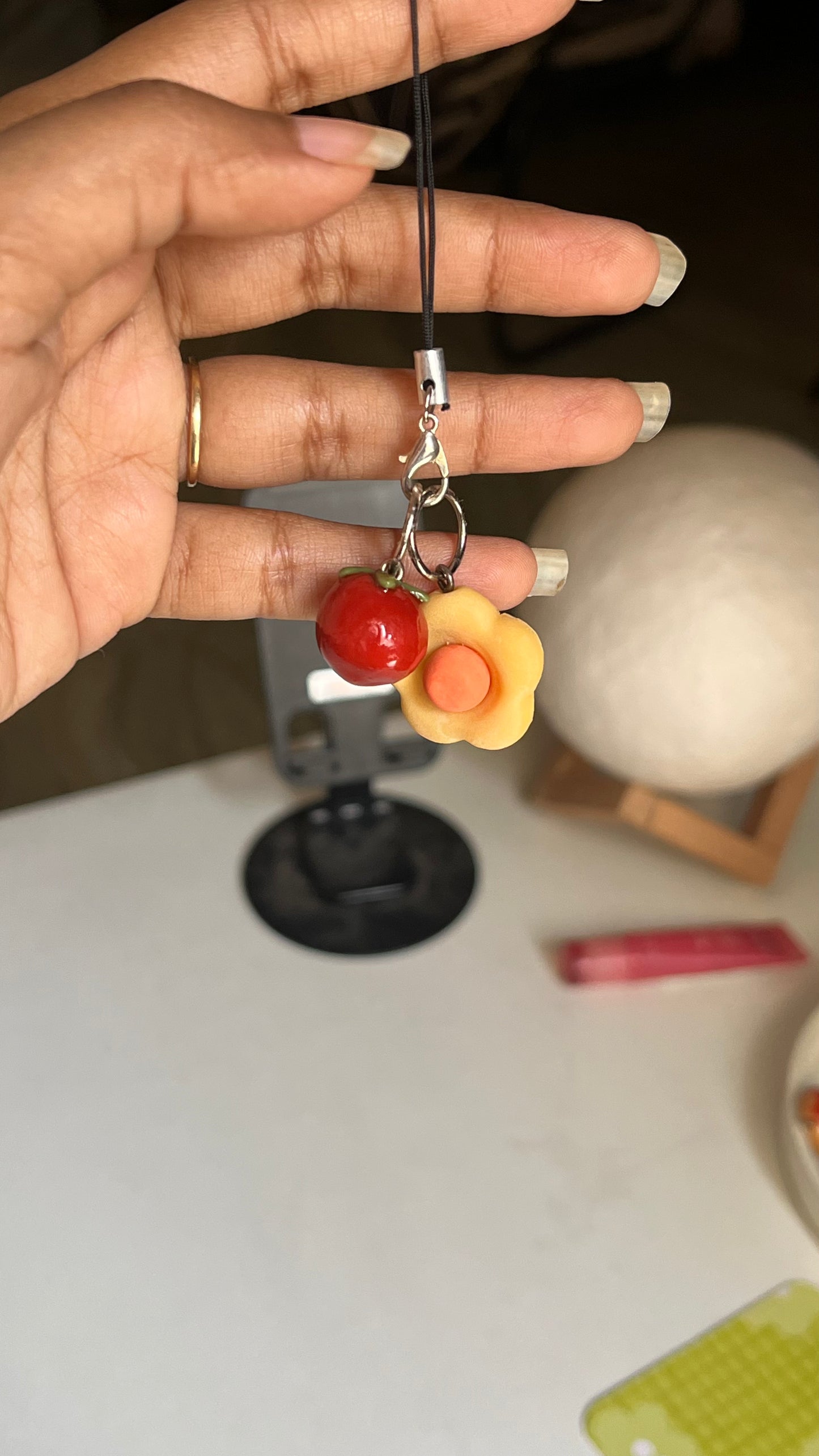flower with tomato charm