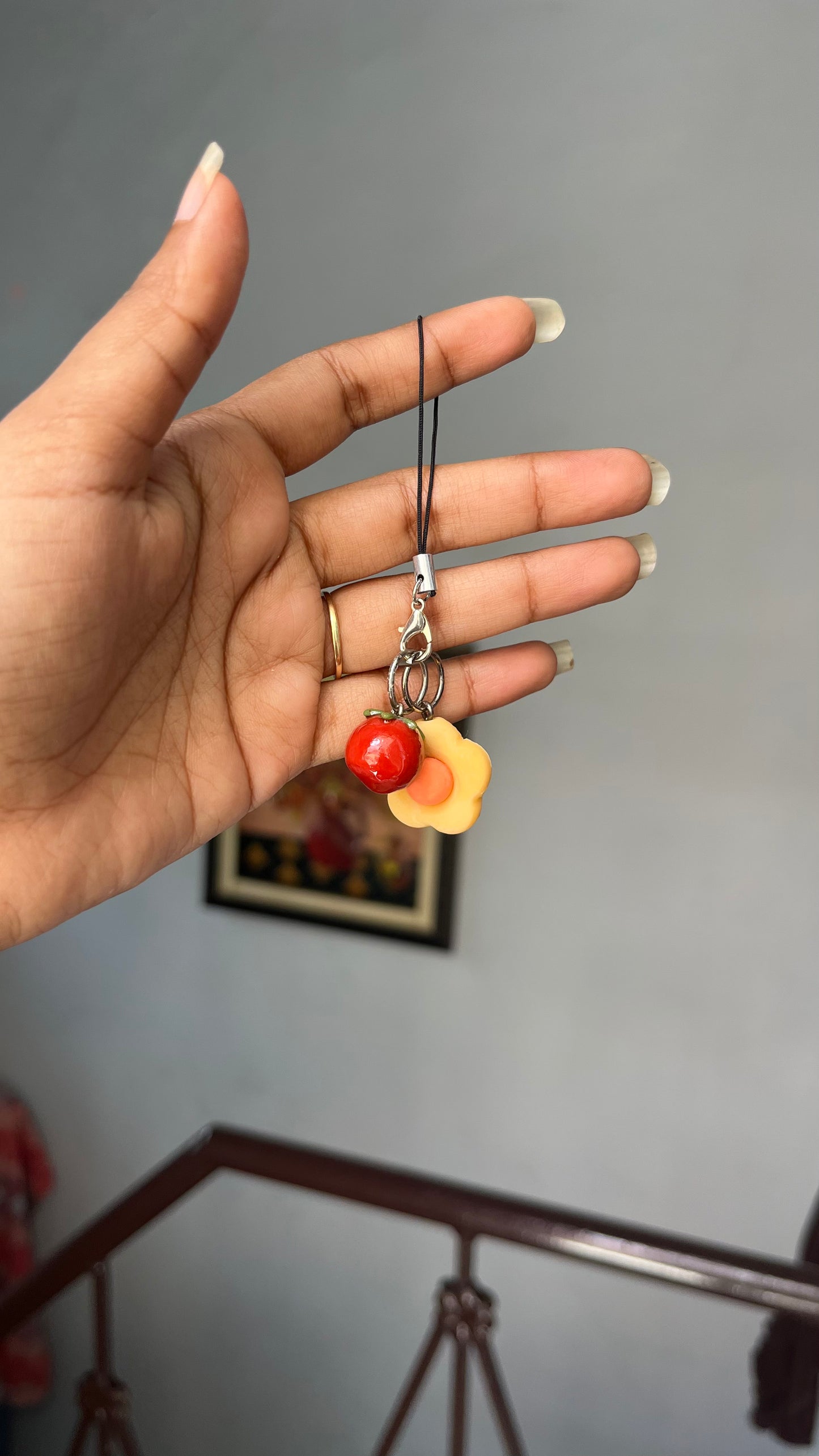 flower with tomato charm