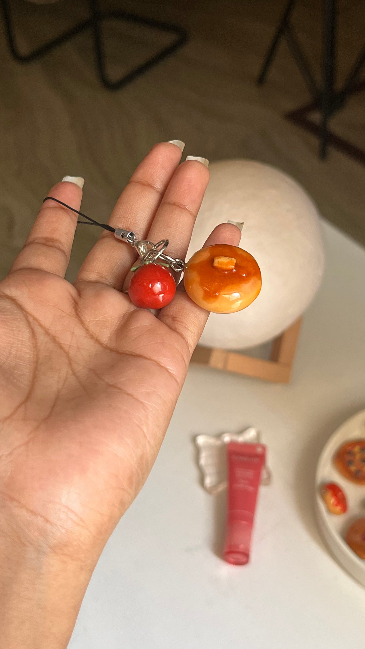 Honey on pancake with tomato charm