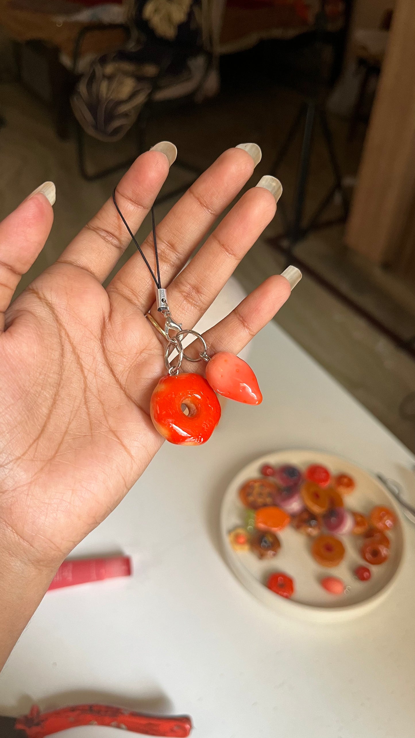 Donut with strawberry syrup charm