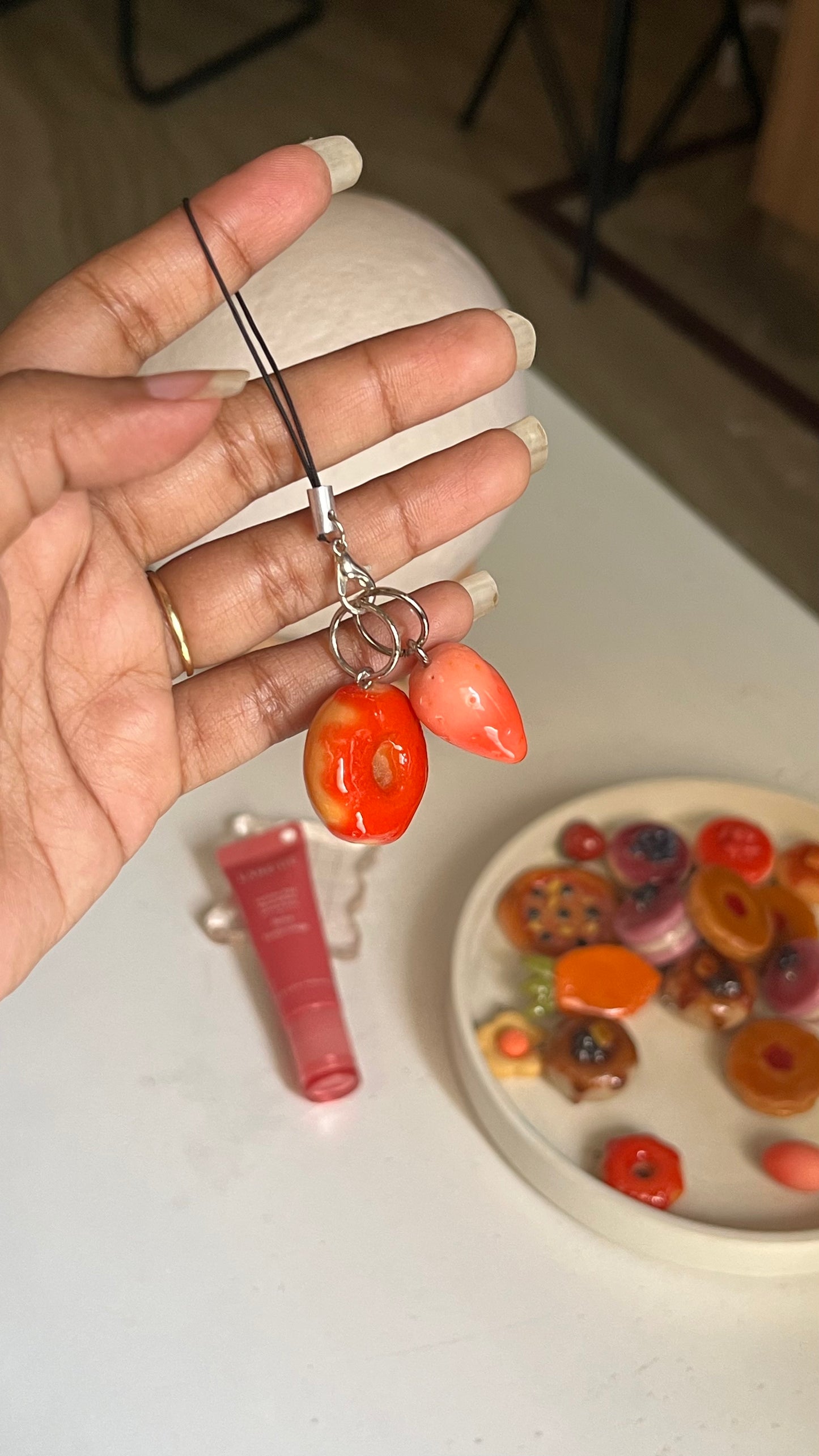 Donut with strawberry syrup charm