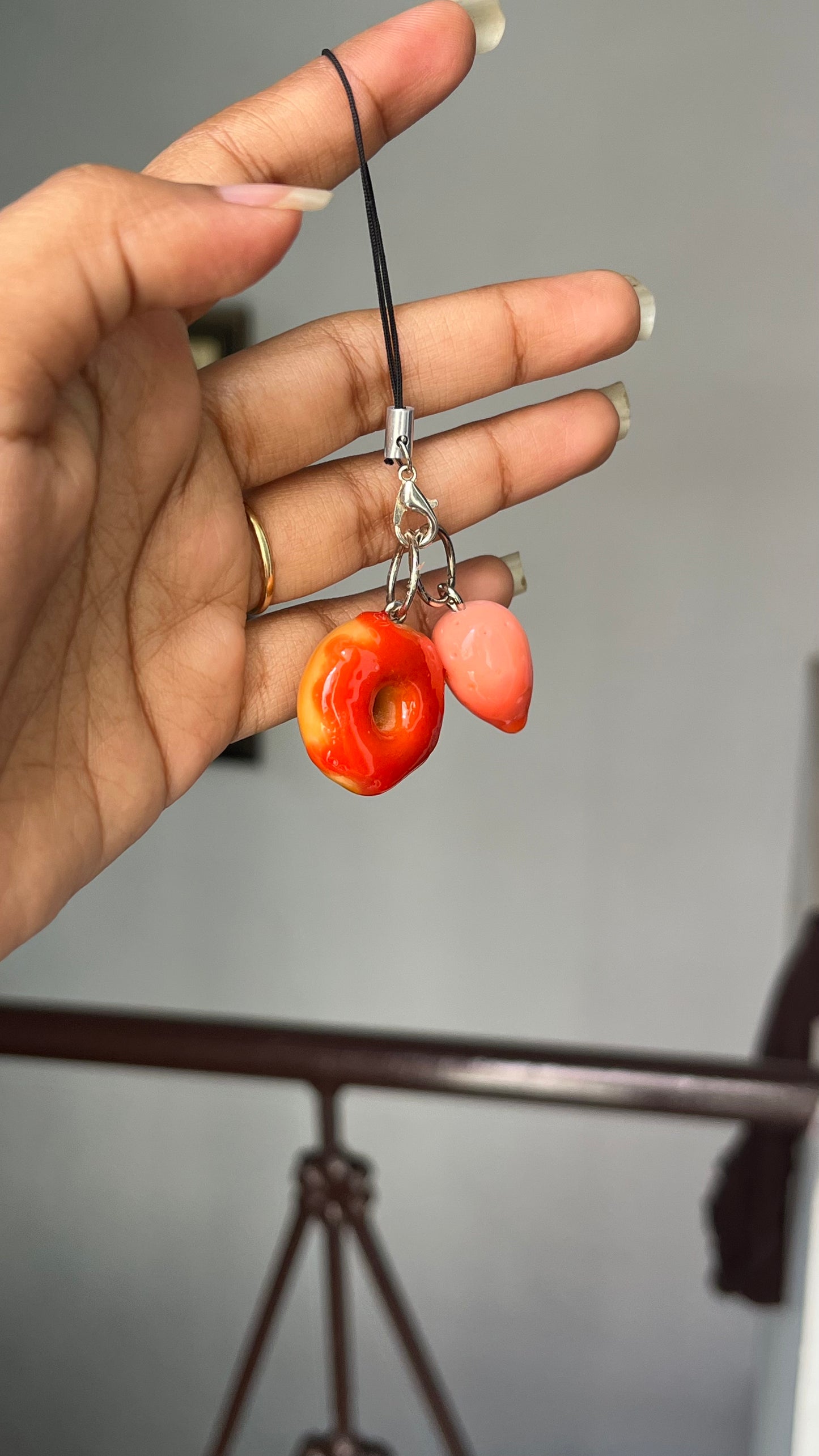 Donut with strawberry syrup charm