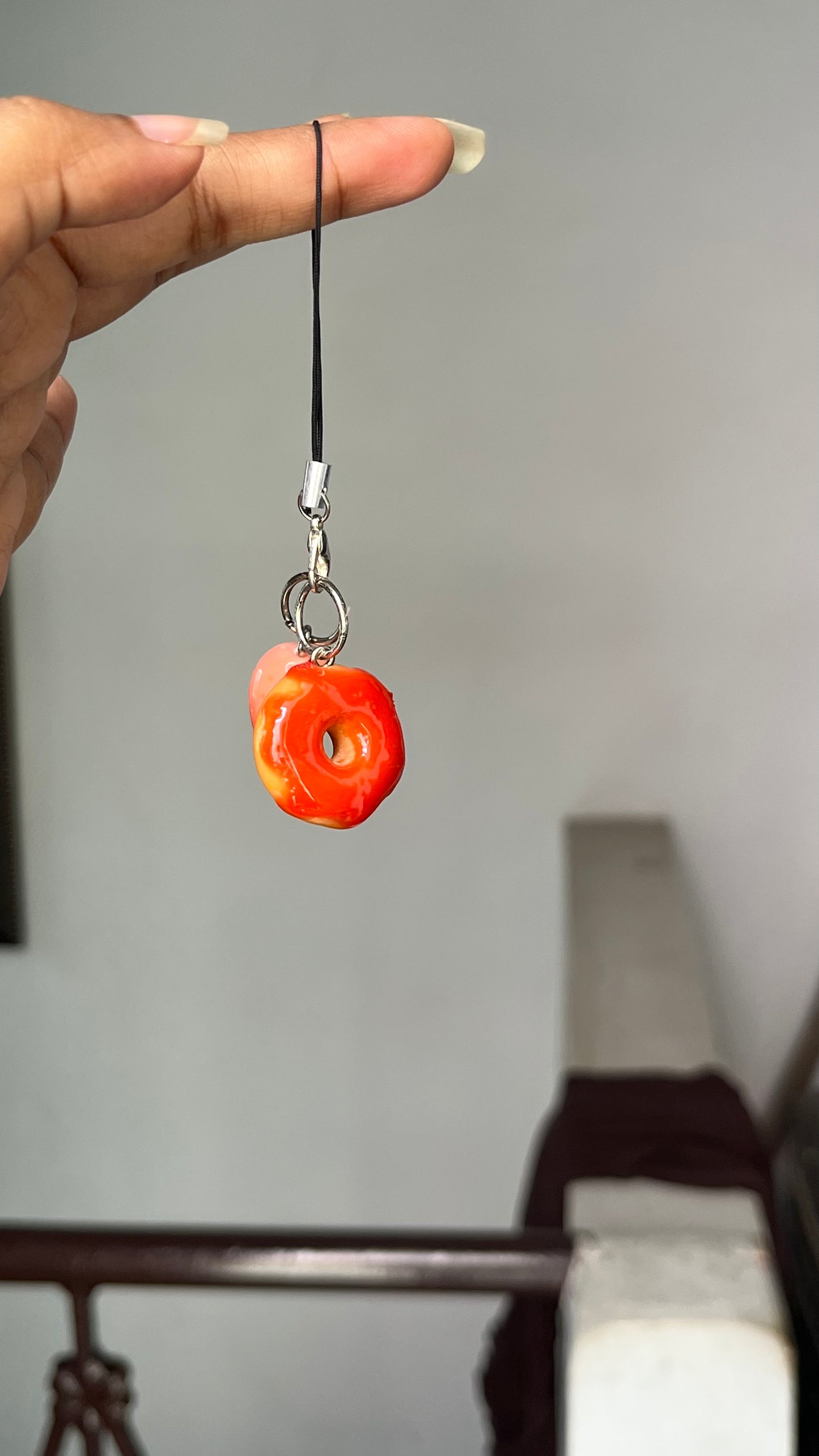 Donut with strawberry syrup charm