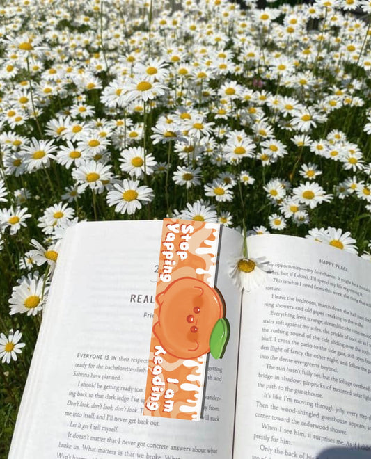 Orange reading guy magnetic bookmark